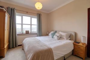 Bedroom One- click for photo gallery